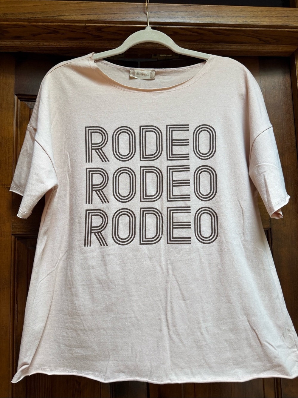 Altar'd State Pale Pink with Brown 'RODEO' Graphic Short Sleeve Tee